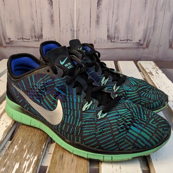 Nike Shoes - Nike light free running TR fit 5 704695-016 womens